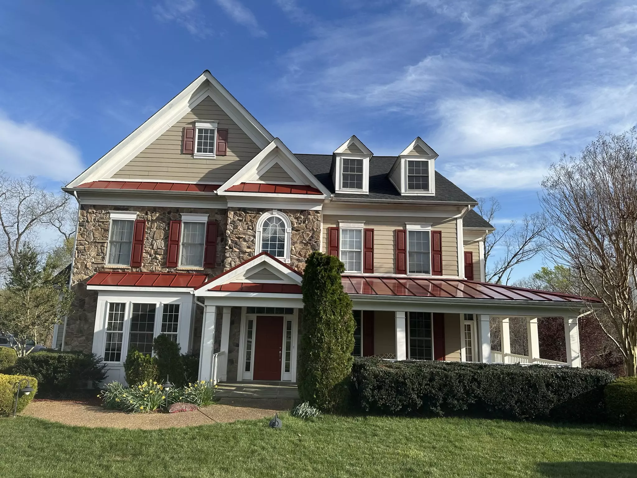 Metal roofing panels completed on a residential home
