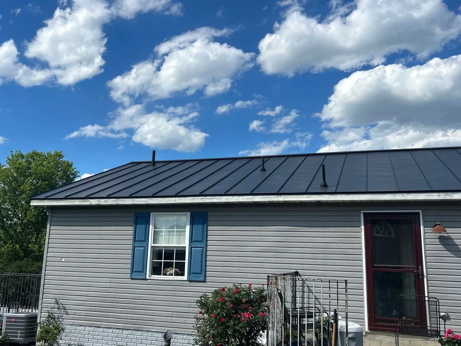 Charcoal standing seam metal roof on a home in Northern Virginia