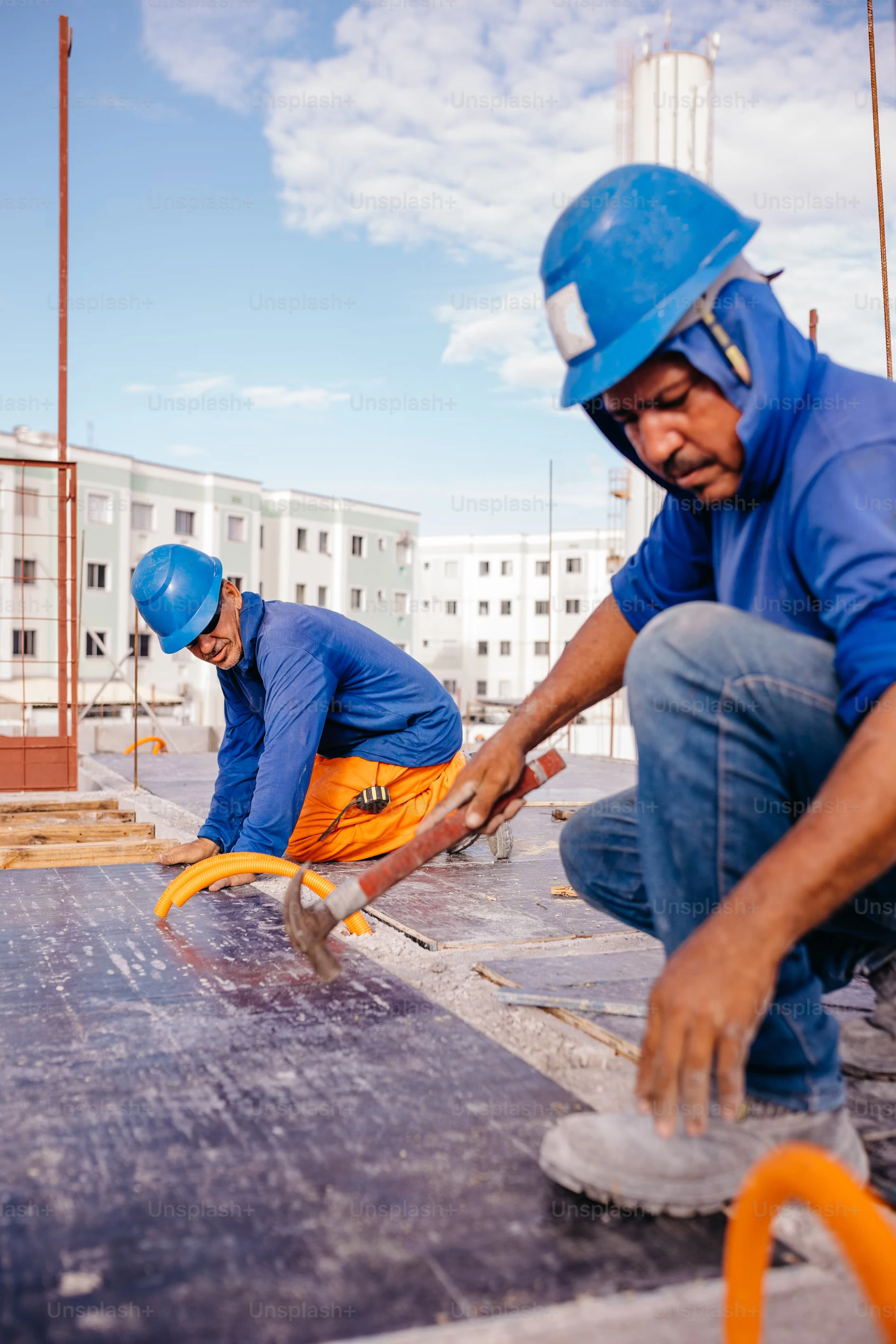 men working on a roof