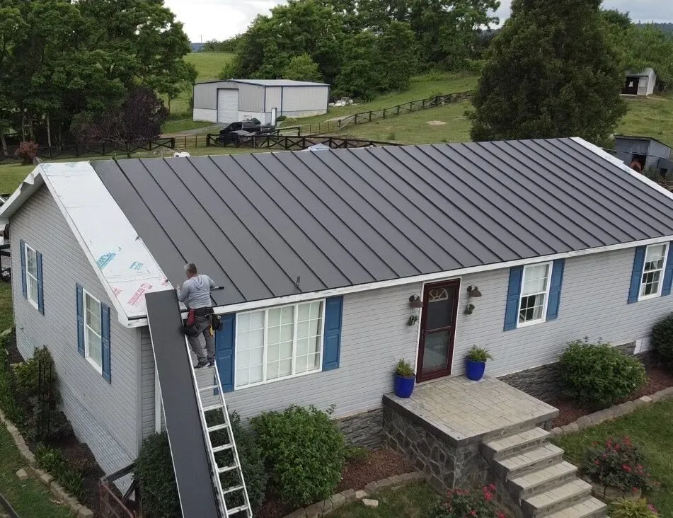Standing seam metal roof installation in progress in Northern Virginia